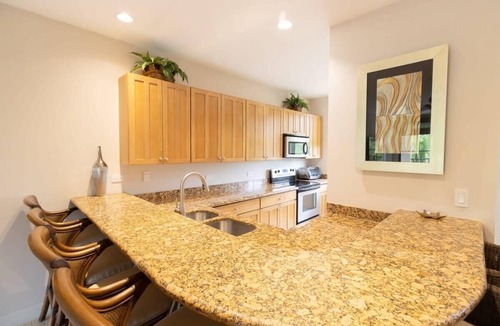 Coco Condo | Chic Condo w/Sparkling Pool & Lush Mountain Views from Shaded Balconies