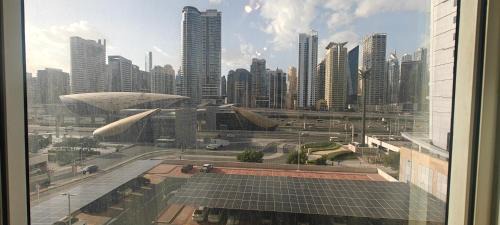Jumeirah Lake Towers Apartment | Cosmos Living Work-Friendly Studio Metro Access