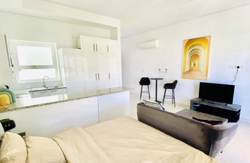 Taqah Apartment | Cosy studio with a lagoon view in Hawana resort