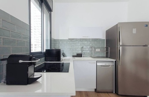 Tel Aviv Promenade Apartment | Cozy 1BR Ben Yehuda by Holiday Rentals SAFE ROOM