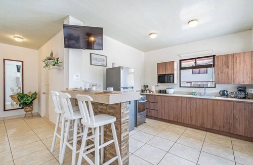 Coco Apartment | Cozy apartment complete with high-speed Wi-Fi, Netflix & serene pool access