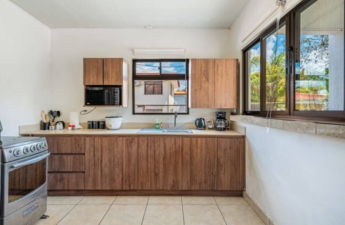 Coco Apartment | Cozy apartment complete with high-speed Wi-Fi, Netflix & serene pool access