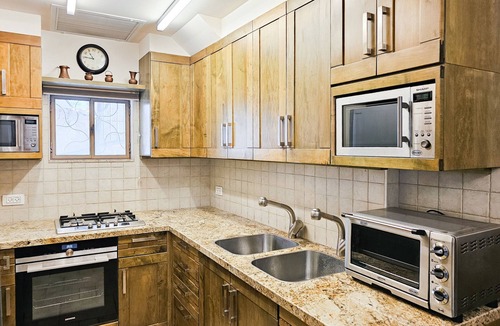 Old City Apartment | Cozy Authentic Retreat in Old City by FeelHome