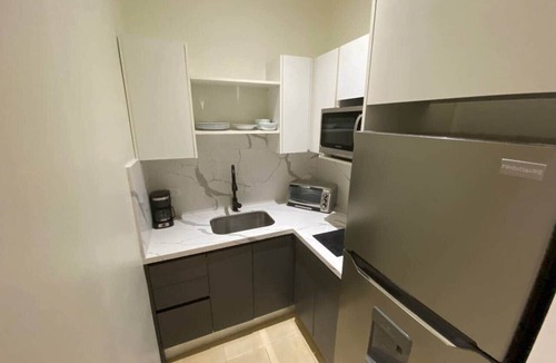 Coco Apartment | Cozy, bright, ground floor studio, pool, walk to beach