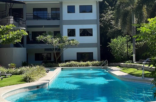 Coco Apartment | Cozy, bright, ground floor studio, pool, walk to beach