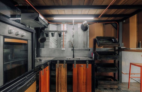 Jaco House | Cozy tropical/industrial quonset located in a secondary tropical forest.