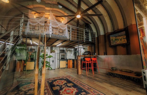Jaco House | Cozy tropical/industrial quonset located in a secondary tropical forest.