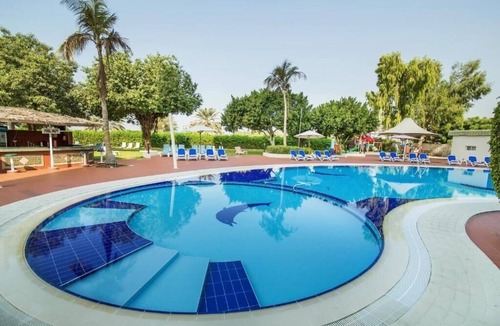 Al Majaz Apartment | Deluxe King Room Near Nakheel Oasis