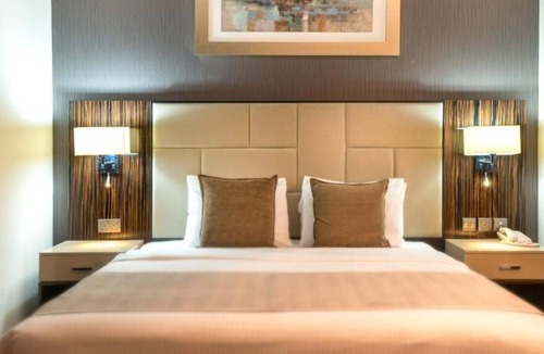 Al Zahiyah Apartment | Deluxe Room Near Abu Dhabi Corniche By Luxury Bookings