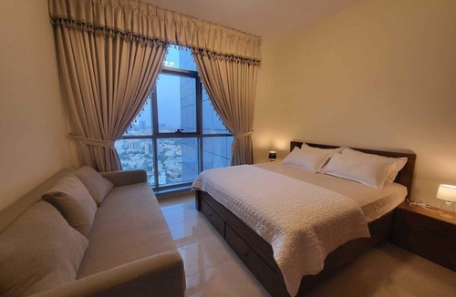 Rumailah Apartment | Duplex Spacious 4-bedroom sunset sea views apartment with swimming pool.
