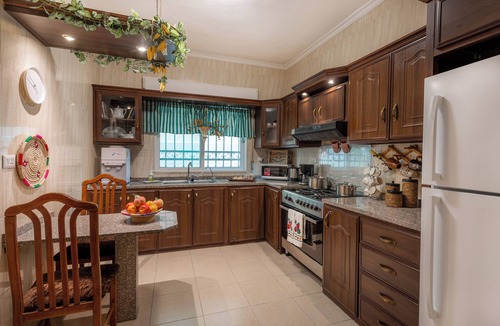 Suwailih Apartment | Elegant 2BR Family Oasis with Lush Private Garden