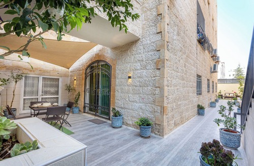 Suwailih Apartment | Elegant 2BR Family Oasis with Lush Private Garden