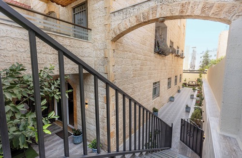 Suwailih Apartment | Elegant 2BR Family Oasis with Lush Private Garden