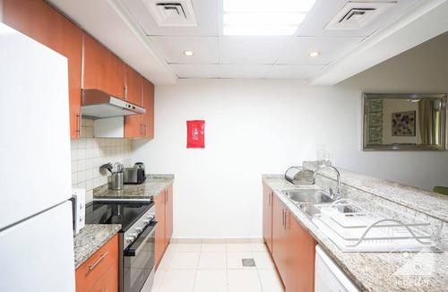 The Greens Apartment | Elegant Ground-Floor 1BR Overlooking Gardens