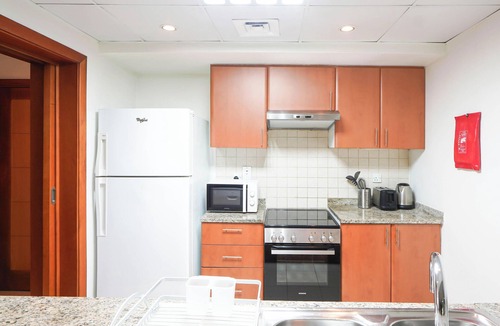 The Greens Apartment | Elegant Ground-Floor 1BR Overlooking Gardens