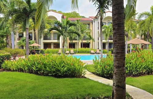Coco Condo | Elegant Two-Bedroom Condo with Oversized Terrace, Resort Pools & Beach Club Access
