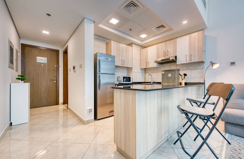 Dubai Production City Apartment | Elegantly furnished studio with balcony in cool Dubai