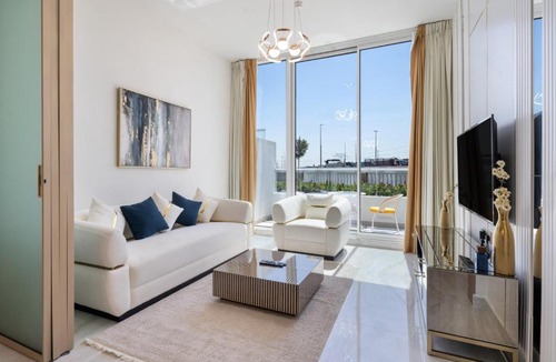 Dubai Apartment | Elite Escape 1BR plus 1GR plus Study Sleeps 4 in Gemz 05