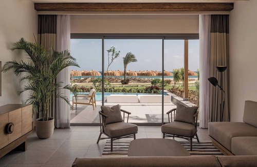 Port Ghalib Hotel | Enjoy Scenic Sunsets From Modern Sea View Suite Steps Away From Coral Diving