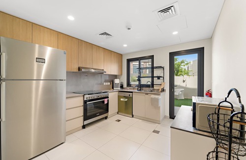 Dubai Villa | Family 4BR Villa with a Shared Pool, Gym & Private Garden