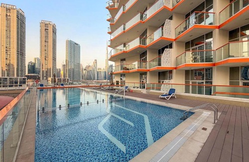 Business Bay Apartment | FIRST CLASS Studio Canal & Burj Khalifa View