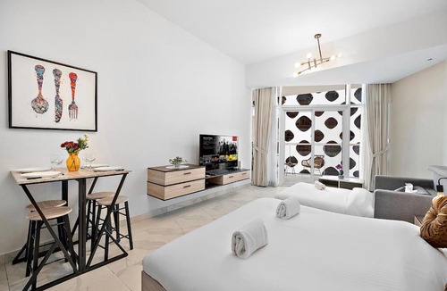 Business Bay Apartment | FIRST CLASS Studio Canal & Burj Khalifa View