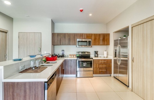 Barrio Santa Lucia Apartment | First-floor condo in Jacó w/terrace, shared pool - near to the beach