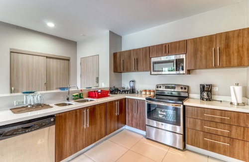 Barrio Santa Lucia Apartment | First-floor condo in Jacó w/terrace, shared pool - near to the beach