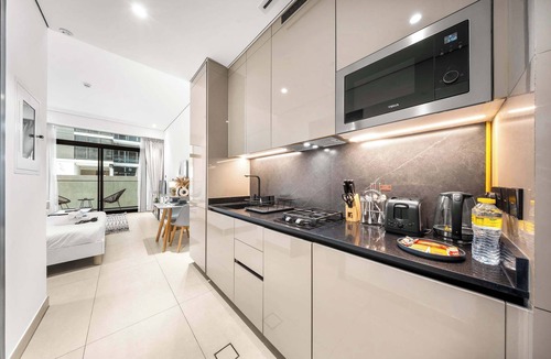 Dubai Production City Apartment | Free housekeeping visits during your stay - StayShort - Modern Studio in Production City Sleeps 3!