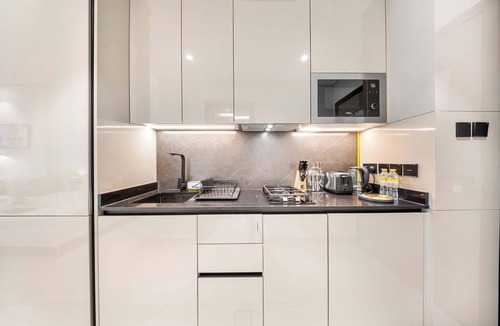 Dubai Production City Apartment | Free housekeeping visits during your stay - StayShort - Modern Studio in Production City Sleeps 3!