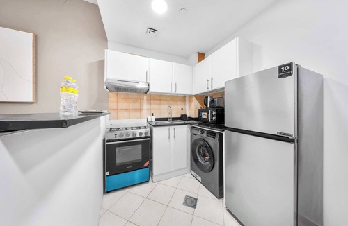 Dubai Production City Apartment | Free Housekeeping Visits During Your Stay - StayShort - Inviting Studio in Production City for 4