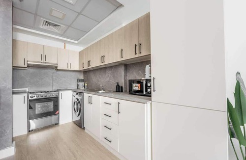 Dubai Sports City Apartment | Free housekeeping visits during your stay - StayShort - Peaceful Studio Apartment at Frankfurt Tower in Sports City