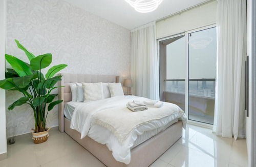 Dubai Production City Apartment | Gala Guests - Serene Lakeside Residences Production City
