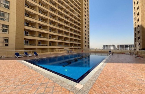 Dubai Production City Apartment | Gala Guests - Serene Lakeside Residences Production City
