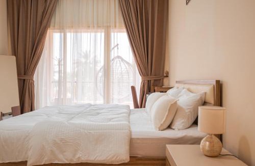 Al Hamra Village Apartment | Golfside Serenity - 2 King Beds - near Al Hamra Mall