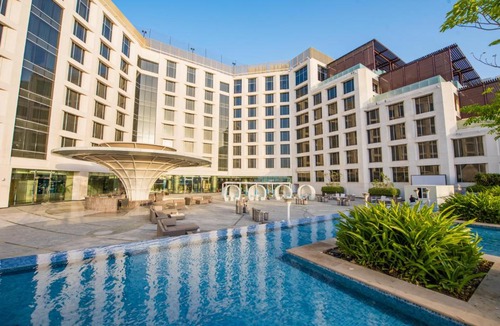 Muscat Hotel | Grand Millennium Muscat connected to Muscat Grand Mall
