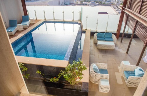 Muscat Hotel | Grand Millennium Muscat connected to Muscat Grand Mall