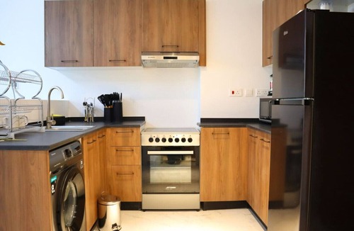 Masdar City Apartment | Heart of Masdar: Your Luxury 1BR Oasis