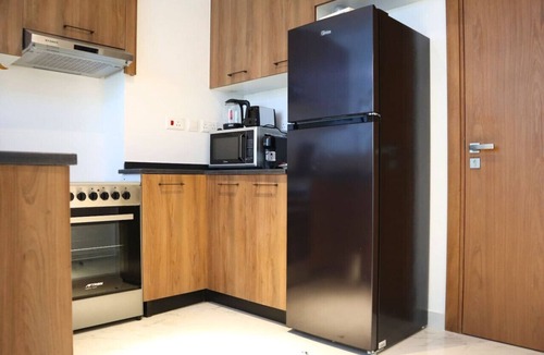 Masdar City Apartment | Heart of Masdar: Your Luxury 1BR Oasis