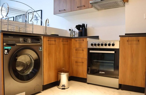 Masdar City Apartment | Heart of Masdar: Your Luxury 1BR Oasis