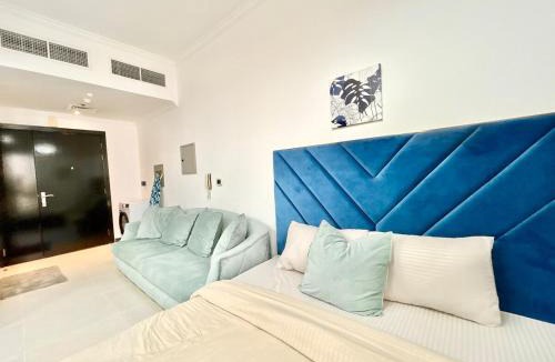 Jumeirah Village Triangle Apartment | Homes2Retreat - Modern Studio with Balcony in JVT