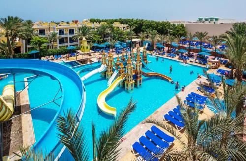 Village Road Resort | Hostgool Beach Chalets Mirage bay resort & aqua park