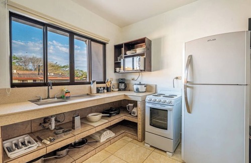 Coco Apartment | Inviting family-friendly apartment with high-speed Wi-Fi, Netflix & pool