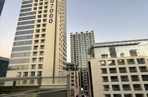 Al Abdali Apartment | Live in the heart of Amman with this luxury one-bedroom suite featuring two balc