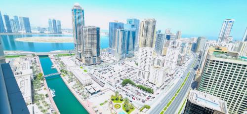 Al Majaz Apartment | Luxury Skyline Apartment with Panoramic Views