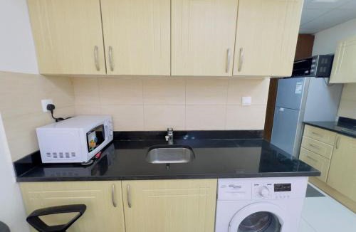 Dubai Sports City Apartment | Mahenti - Elite 1 · Large balcony with all u need