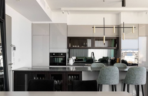 Kerem HaTeimanim Apartment | MAMAD Luxury 2BR with Terrace & Sea View by FeelHome