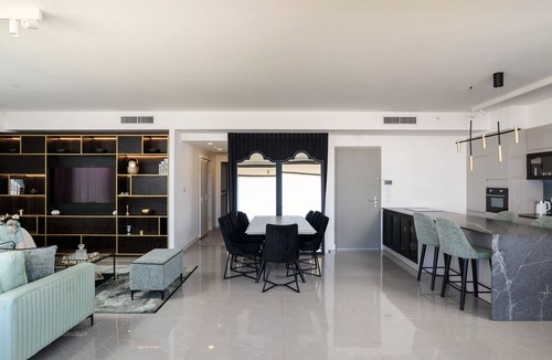 Kerem HaTeimanim Apartment | MAMAD Luxury 2BR with Terrace & Sea View by FeelHome