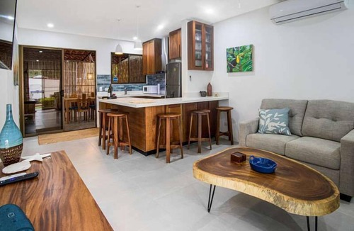 Coco Apartment | Minimalist Condo with a Beautiful New Design, Enclosed Patio, and Shared Community Pool