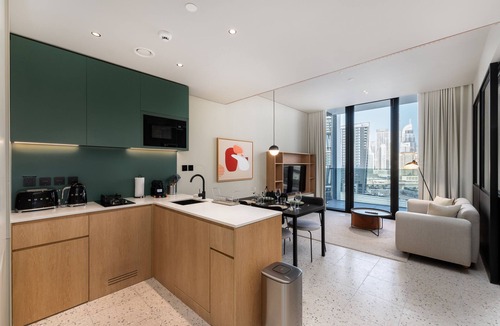 Business Bay Apartment | Modern Comfort: 1BR w/Burj Khalifa View